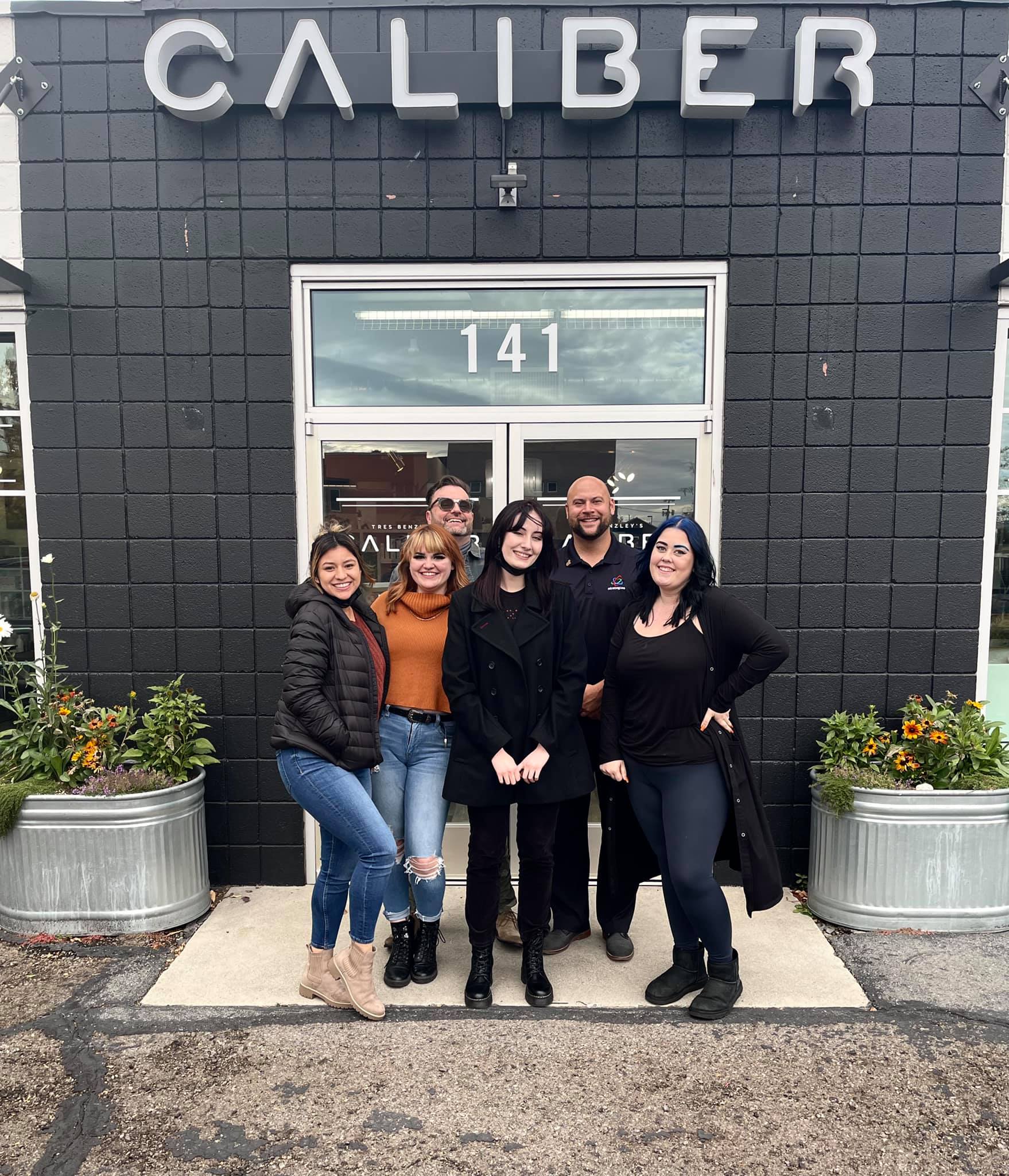 The Caliber team outside their salon