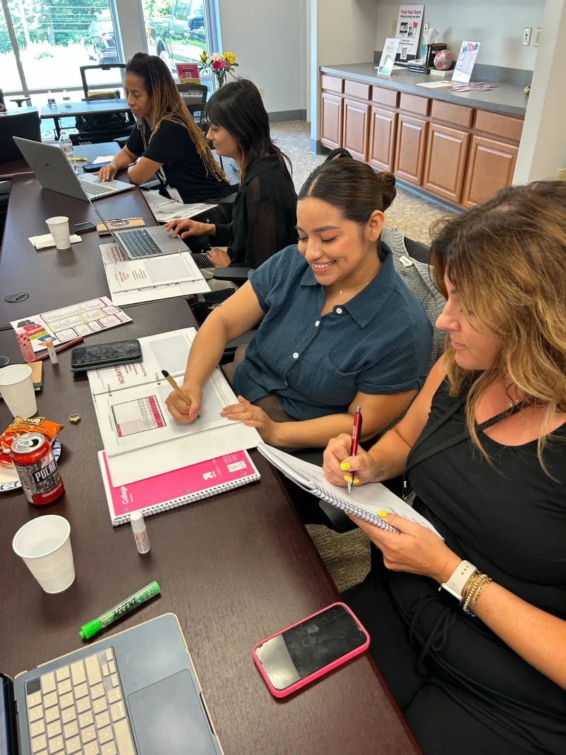 Incubator participants working together on their business plans